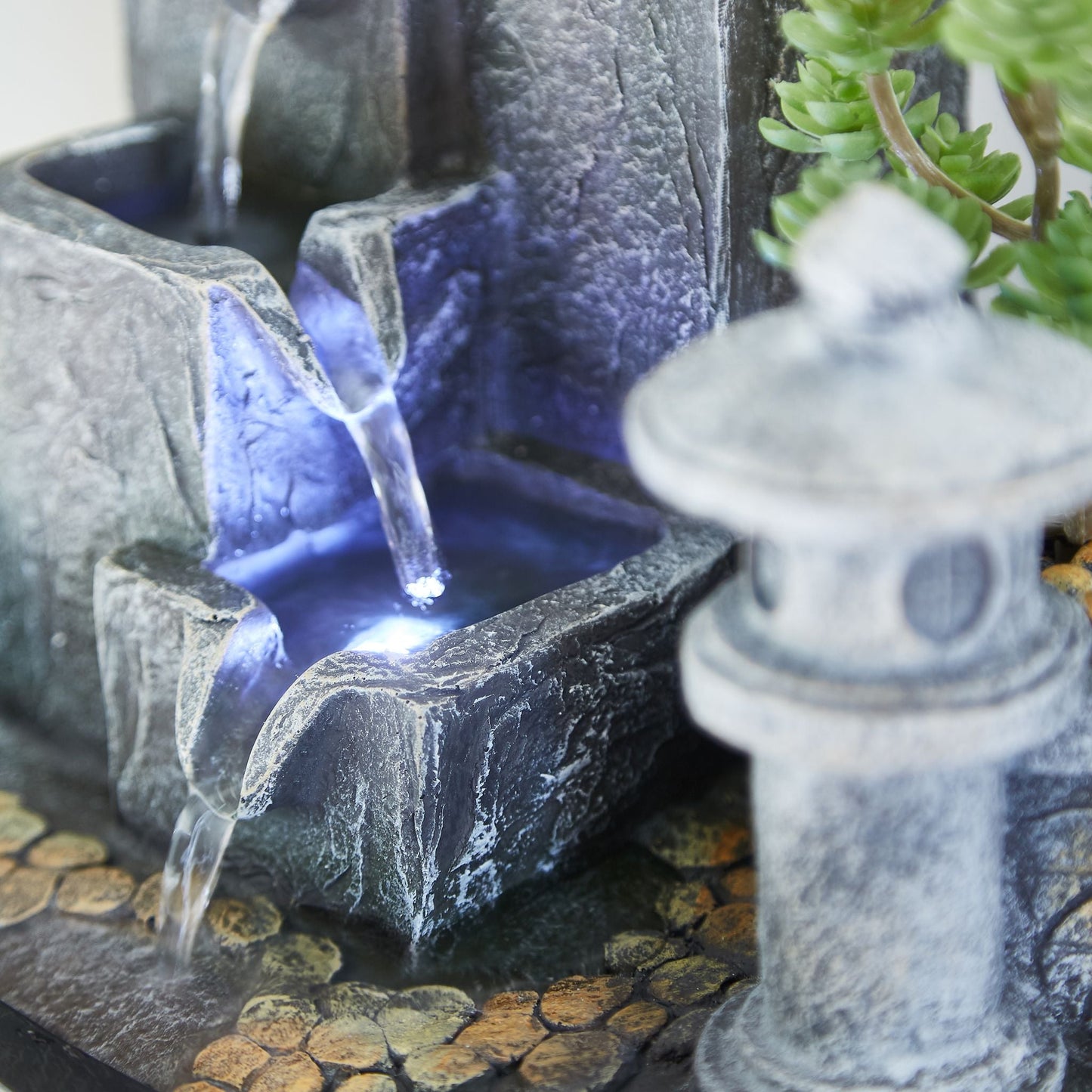 Garden theme indoor tabletop water feature close up